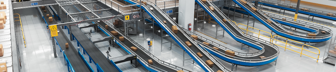 Parcels, cardboard boxes, and packages moving on a conveyor belt at a modern logistics facility. 